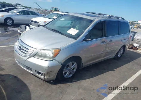 2009 Honda Odyssey Touring z USA, uszkodzony, nr VIN 5FNRL38989B011507